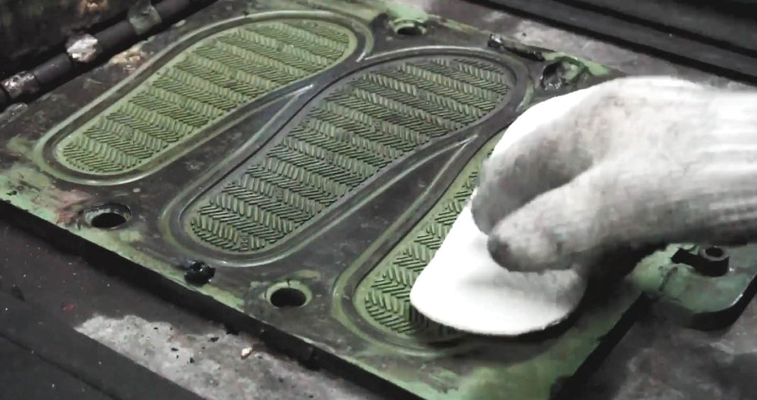 Mid of the flip flop making process, specifically the sole of the flip flop.