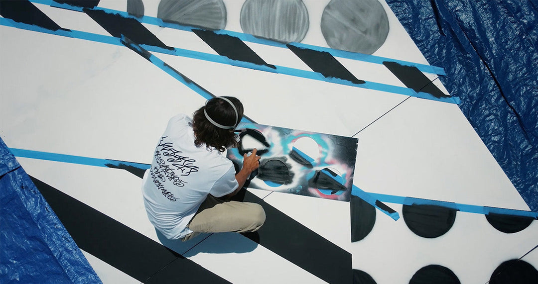 Jason Woodside at Vissla's 25th Annual Cosmic Creek surf art event