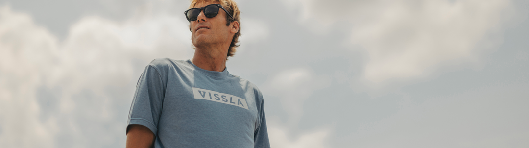 Photo of surfer Eric Geiselmanin a Vissla Comp Lite Dri Release Tee