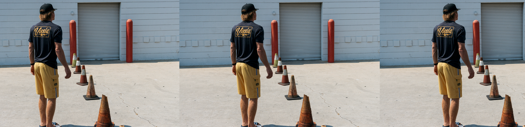 Photo of surfer Eric Geiselmanin a Vissla Comp Lite Dri Release Tee