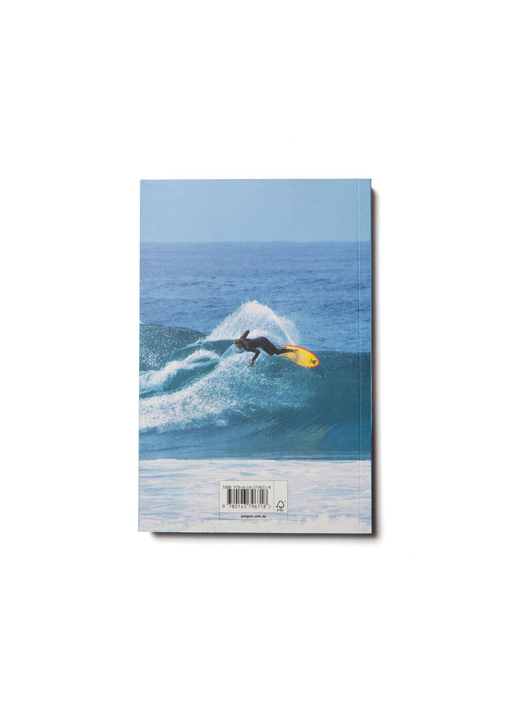 The back cover of the book with an image of a surfer riding a wave with a yellow board
